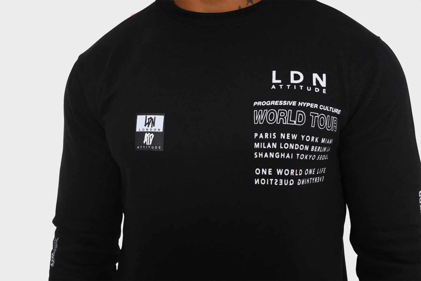 London Attitude "World Tour" Graphic Sweatshirt in Black - London Attitude